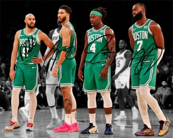 Four Boston Celtics basketball players in green jerseys, signed autographs