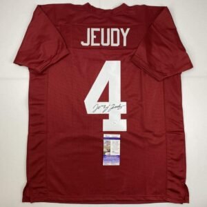 Red Jeudy football jersey with number 4, signature, and authentication tag
