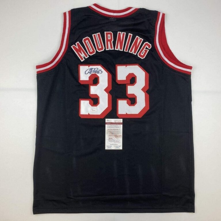 Black basketball jersey with "MOURNING" and "33" signed by Alonzo Mourning
