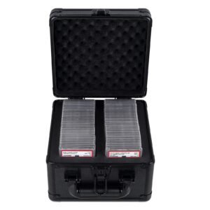Open black case with graded sports cards inside, foam padding