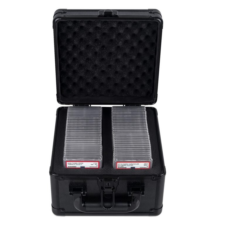 Open black case with graded sports cards inside, foam padding