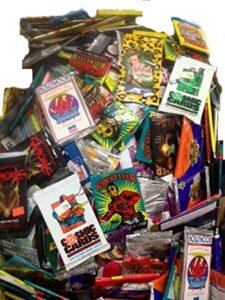 Pile of vintage trading card packs, including Cosmic Cards and Rocketeer