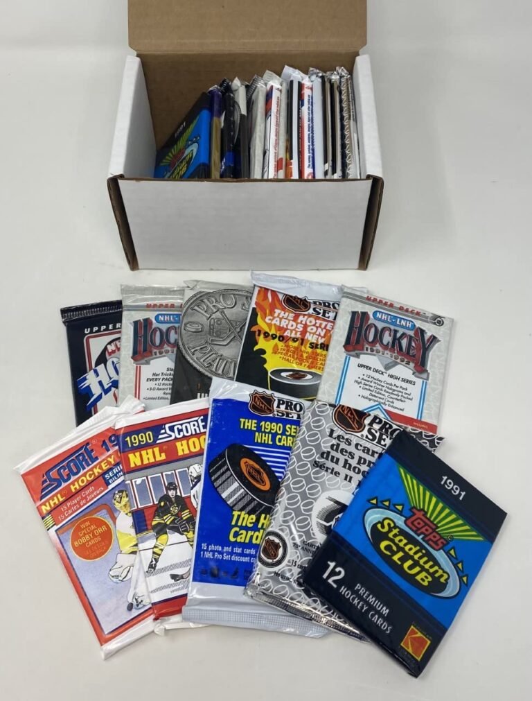 Box of vintage hockey card packs, including Score, Upper Deck, and Topps