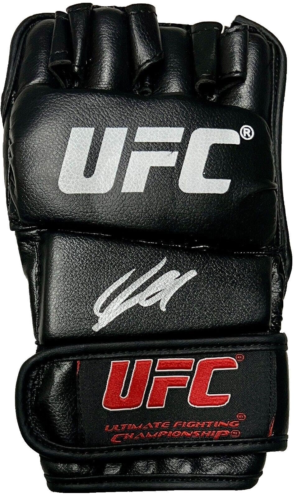 Black UFC mixed martial arts glove with logo and signature