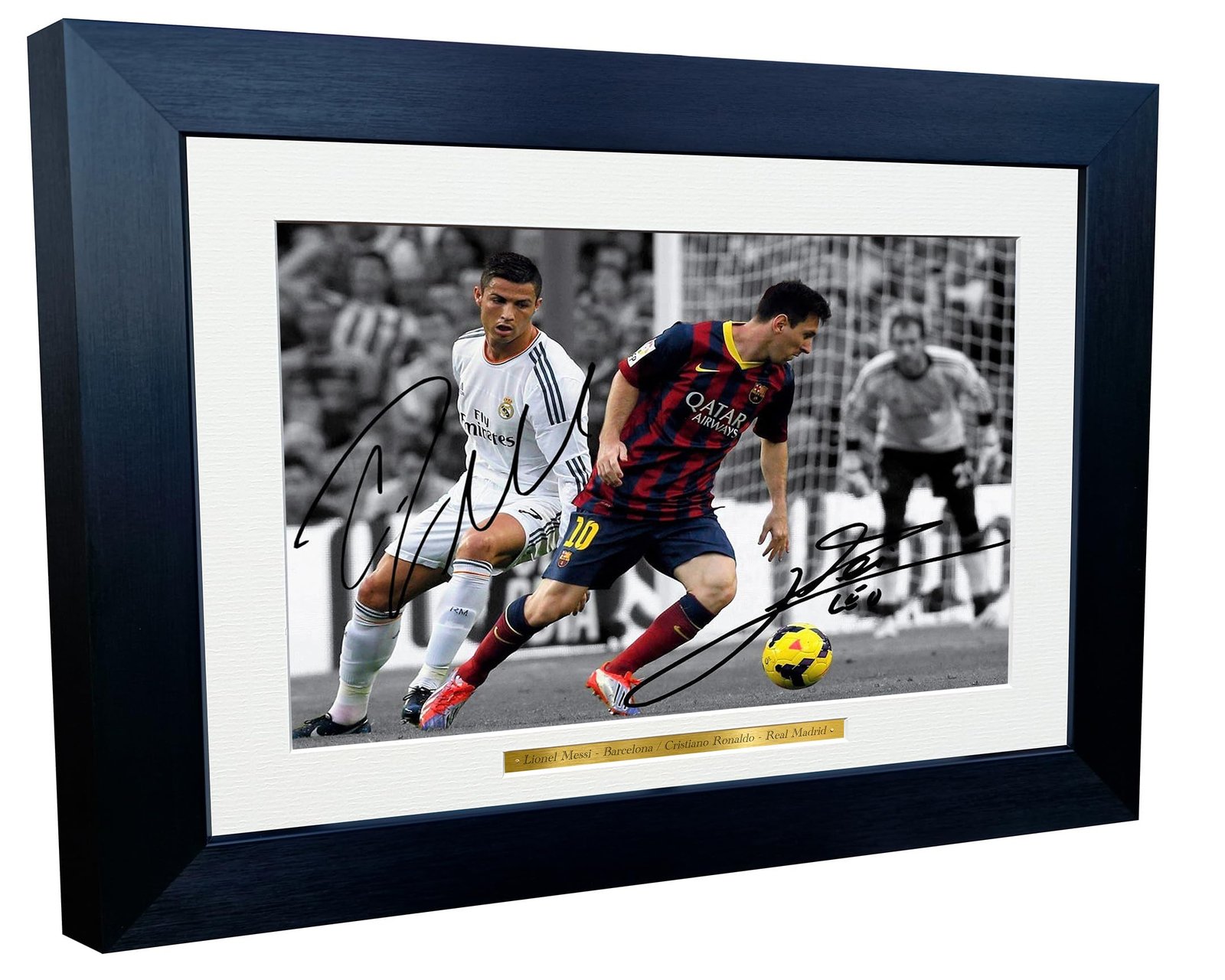 Framed photo of Lionel Messi and Cristiano Ronaldo playing soccer